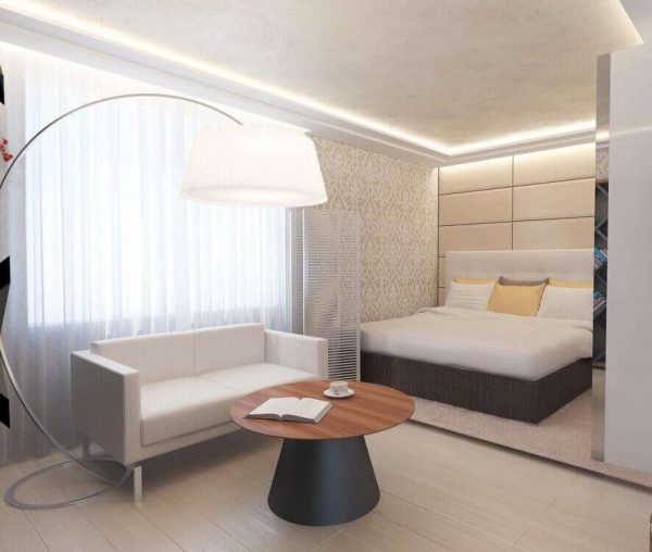 светлый интерьер гостиной спальни 18 кв. метров