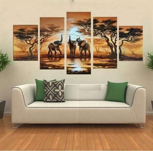 африканская саванна модульная картина в интерьере гостиной над диваном