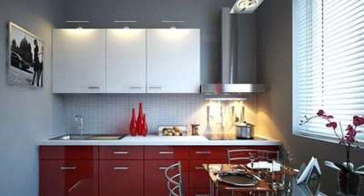 интерьер малогабаритной кухни с красными и белыми фасадами