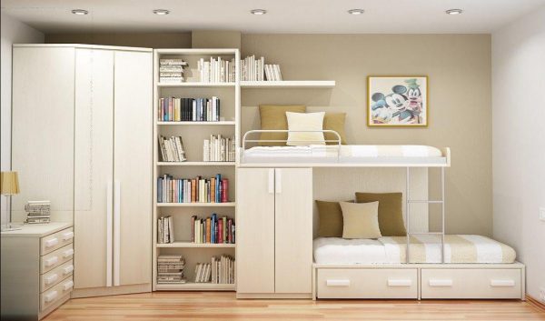 белая мебель со шкафами и кроватьями в детской комнате для девочек